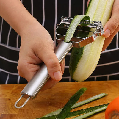 Stainless Steel Kitchen Peeler: Multi-Use Veggie & Fruit Slicer.